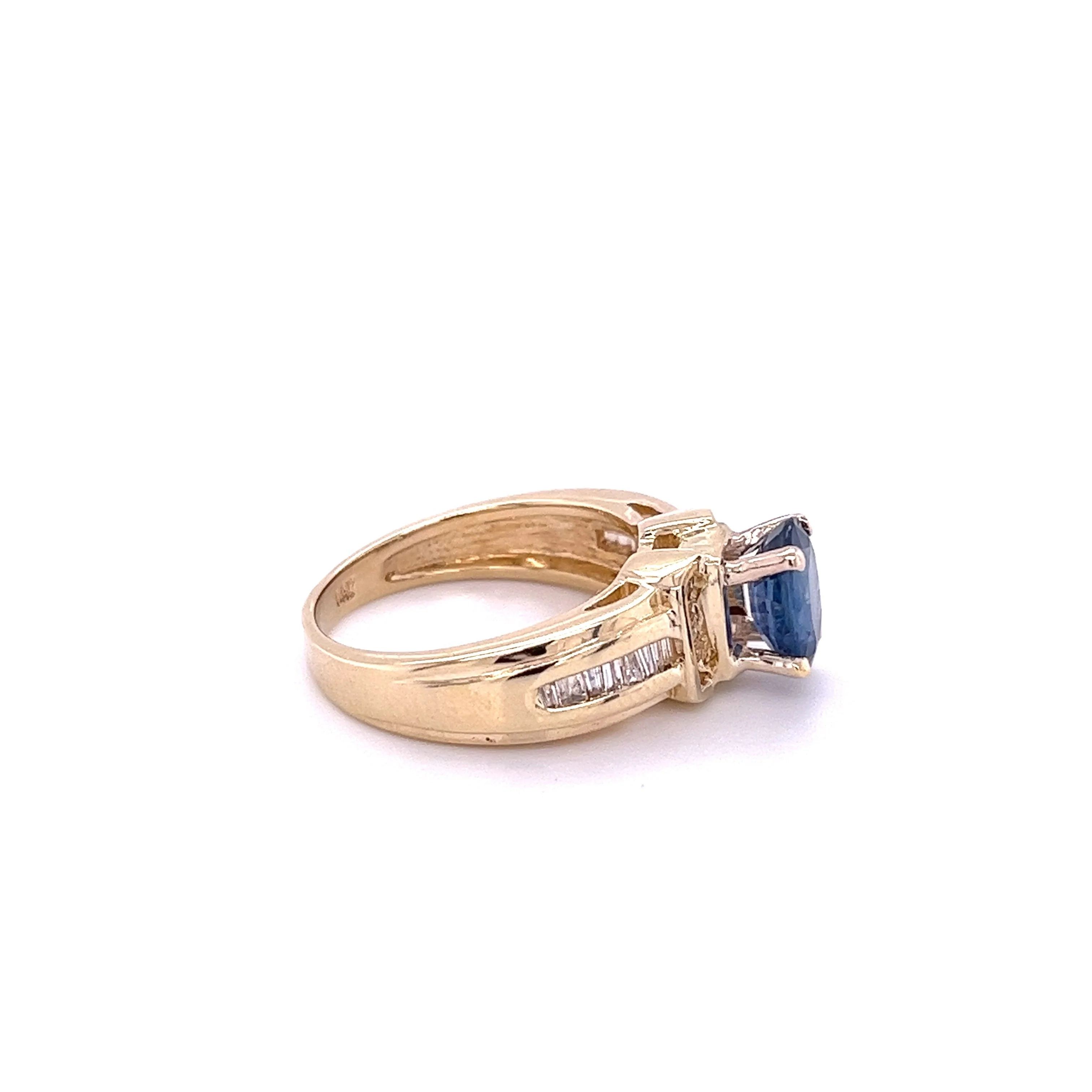 1.22 Carat Oval Cut Blue Sapphire with Baguette Cut Diamonds in 14k Gold Ring - Image 2