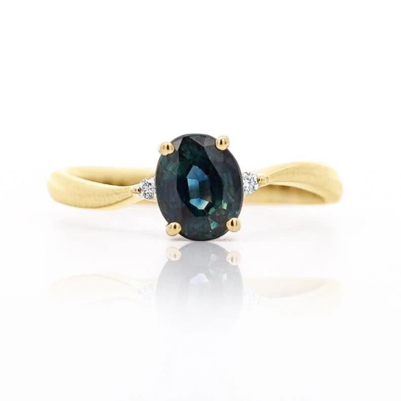 1.3 Carat Oval Cut Blue Sapphire and Diamond 3 Stone Curvy Ring