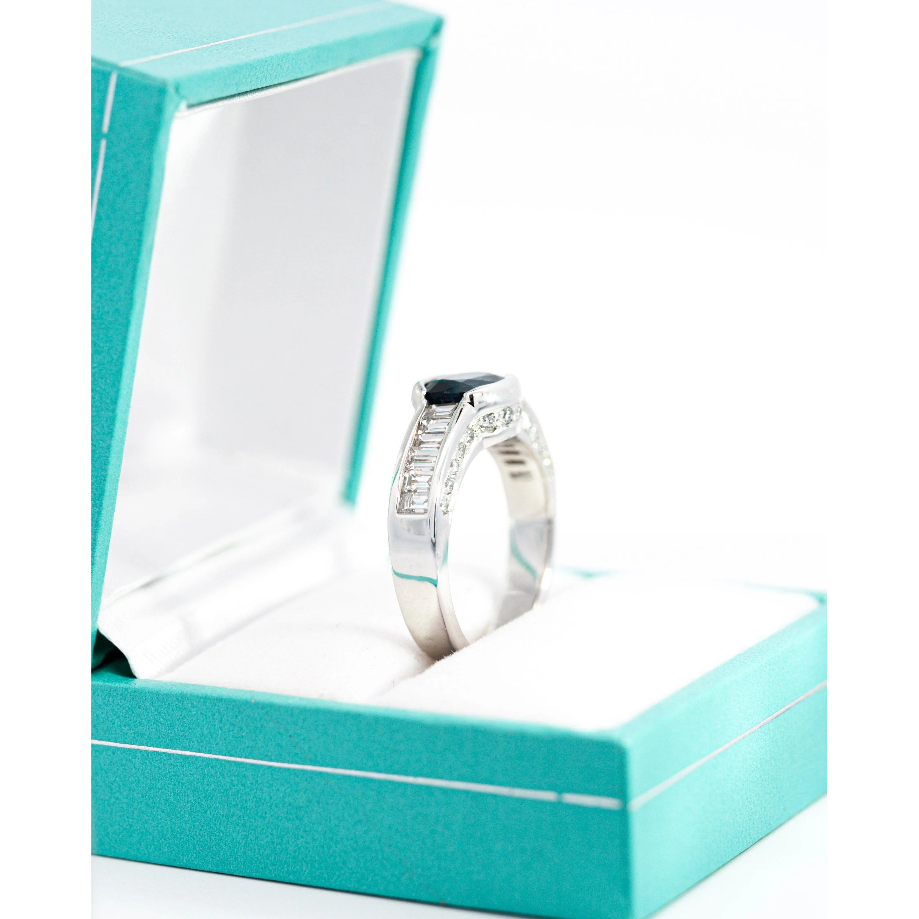 18K White Gold Bezel and Channel Set Oval Cut Blue Sapphire & Baguette Diamond Ring - Image 4