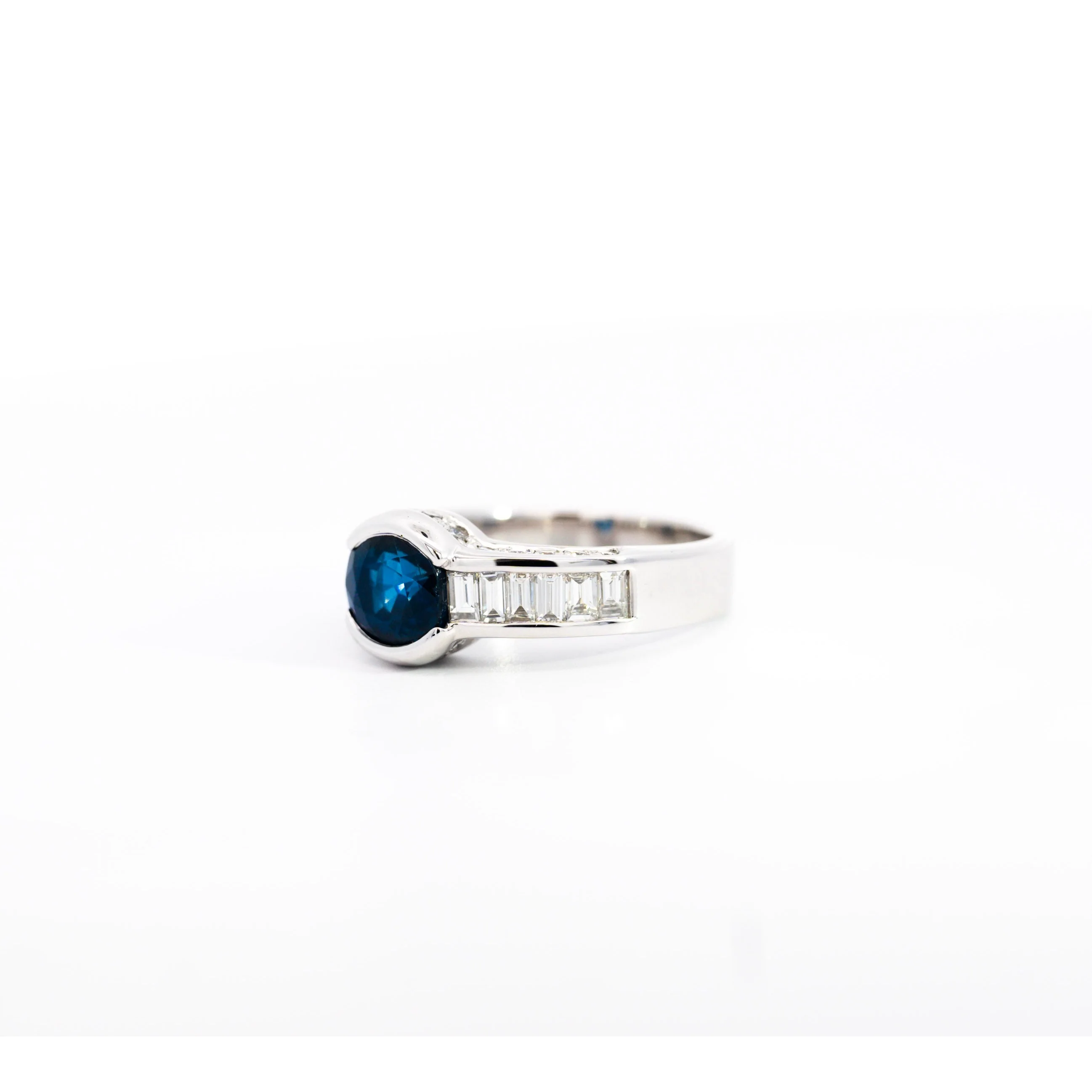 18K White Gold Bezel and Channel Set Oval Cut Blue Sapphire & Baguette Diamond Ring - Image 7